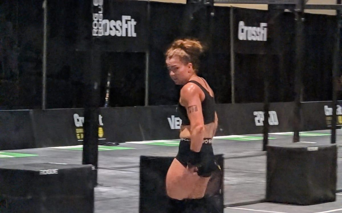An athlete running between stations in a gym