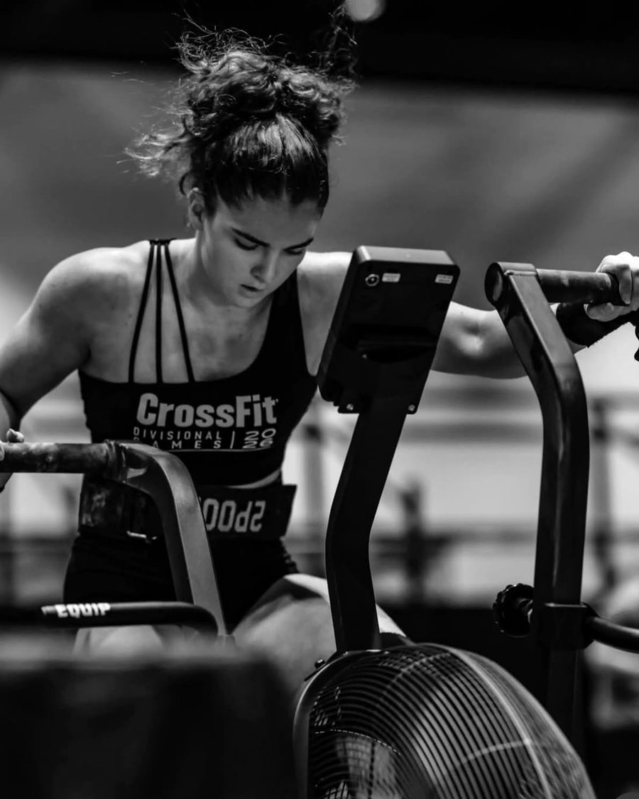 Charlotte Atkinson training on an air bike