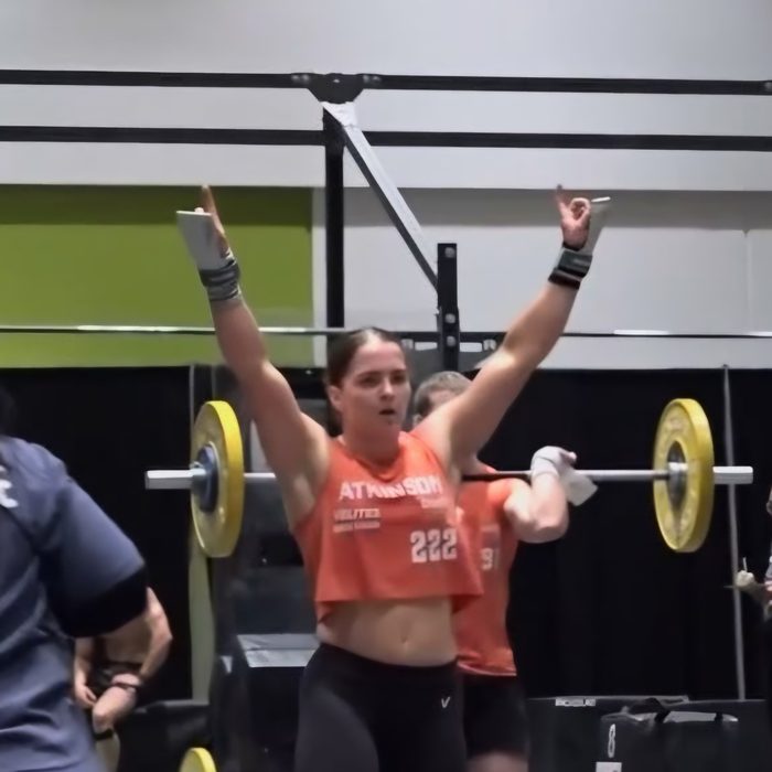 An athlete celebrating after a lift